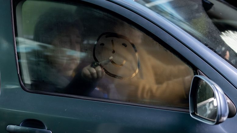 In her Car